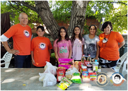 Kids donating food to poor